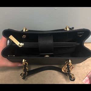 Michael Kors Black Purse w/ Gold Accents.
